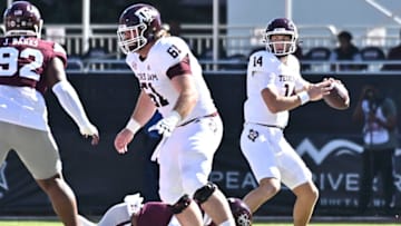 Oct 1, 2022; Starkville, Mississippi, USA; Texas A&M Aggies quarterback Max Johnson (14) looks to pass against the Mississippi State Bulldogs during the first quarter at Davis Wade Stadium at Scott Field. Mandatory Credit: Matt Bush-USA TODAY Sports