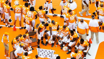 Tennessee players review plays on the sideline during the Alabama and Tennessee football game at Neyland Stadium at the University of Tennessee in Knoxville, Tenn., on Saturday, Oct. 24, 2020.Tennessee Vs Alabama Football 100369