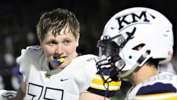 Kettle Moraine senior Trey Wedig looks to a teammate during a timeout against Waukesha West on August 23, 2019.Rs5a4694