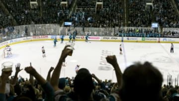 Oct 10, 2015; San Jose, CA, USA; San Jose Sharks fans celebrate after San Jose Sharks center Patrick Marleau (12) scored against the Anaheim Ducks in the 2nd period at SAP Center at San Jose. Mandatory Credit: John Hefti-USA TODAY Sports