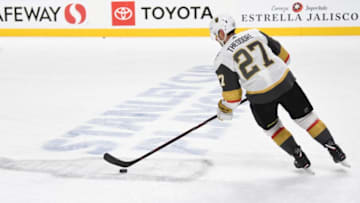 SAN JOSE, CA - APRIL 23: Shea Theodore #27 of the Vegas Golden Knights warms up prior to Game Seven of the Western Conference First Round against the San Jose Sharks during the 2019 Stanley Cup Playoffs at SAP Center on April 23, 2019 in San Jose, California. (Photo by Jeff Bottari/NHLI via Getty Images)