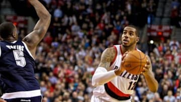 Feb 11, 2014; Portland, OR, USA; Portland Trail Blazers power forward LaMarcus Aldridge (12) takes a shot over Oklahoma City Thunder with 5 seconds remaining in the game at the Moda Center. Mandatory Credit: Craig Mitchelldyer-USA TODAY Sports