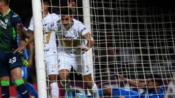 Pumas forward Juan Ignacio Dinenno celebrates after scoring his team's opener against Cruz Azul on Tuesday night. (Photo by PEDRO PARDO/AFP via Getty Images)
