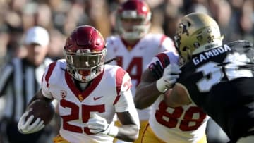 BOULDER, CO - NOVEMBER 11: Ronald Jones II #25 of the USC Trojans carries the ball against the Colorado Buffaloes at Folsom Field on November 11, 2017 in Boulder, Colorado. (Photo by Matthew Stockman/Getty Images)