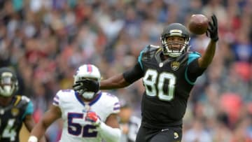 Oct 25, 2015; London, United Kingdom; Jacksonville Jaguars tight end Julius Thomas (80) attempts to catch a pass against the Buffalo Bills during NFL International Series game at Wembley Stadium. Mandatory Credit: Kirby Lee-USA TODAY Sports