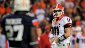 Nov 16, 2013; Auburn, AL, USA; Georgia Bulldogs quarterback Aaron Murray (11) reacts during the second half against the Auburn Tigers at Jordan Hare Stadium. The Tigers defeated the Bulldogs 43-38. Mandatory Credit: Shanna Lockwood-USA TODAY Sports