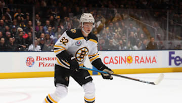 TORONTO, ONTARIO - NOVEMBER 15: Trent Frederic #82 of the Boston Bruins skates against the Toronto Maple Leafs at the Scotiabank Arena on November 15, 2019 in Toronto, Ontario, Canada. (Photo by Bruce Bennett/Getty Images)