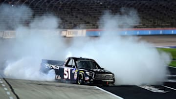FORT WORTH, TEXAS - JUNE 07: Greg Biffle, driver of the #51 Toyota Toyota, celebrates with a burnout after winning the NASCAR Gander Outdoors Truck Series SpeedyCash.com 400 at Texas Motor Speedway on June 07, 2019 in Fort Worth, Texas. (Photo by Jared C. Tilton/Getty Images)