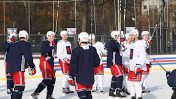 NEW YORK, NY - DECEMBER 02: The New York Rangers salute the fans in attendance following the teams open practice outside at Lasker Rink in Central Park, New York on December 2, 2017. (Photo by Jared Silber/NHLI via Getty Images)