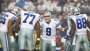 Sep 7, 2014; Arlington, TX, USA; Dallas Cowboys quarterback Tony Romo (9) in the huddle in the first quarter against the San Francisco 49ers at AT&T Stadium. Mandatory Credit: Matthew Emmons-USA TODAY Sports