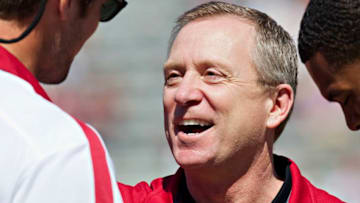 FAYETTEVILLE, AR - APRIL 21: Athletic Director Jeff Long of the Arkansas Razorbacks talks to former players on the sidelines during the Spring Game at Donald W. Reynolds Stadium on April 21, 2012 in Fayetteville, Arkansas. (Photo by Wesley Hitt/Getty Images)