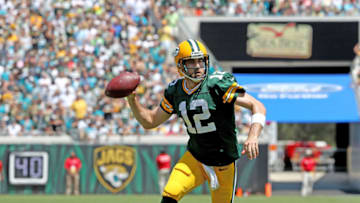 JACKSONVILLE, FL - SEPTEMBER 11: Aaron Rodgers #12 of the Green Bay Packers scores in the first quarter against the Jacksonville Jaguars at EverBank Field on September 11, 2016 in Jacksonville, Florida. (Photo by Sam Greenwood/Getty Images)