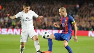 Marco Verratti of Paris Saint-Germain in action with Andres Iniesta. (Photo by Xavier Laine/Getty Images)