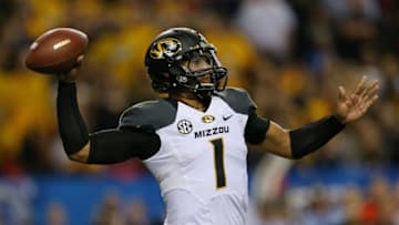 ATLANTA, GA - DECEMBER 07: Quarterback James Franklin #1 of the Missouri Tigers passes against the Auburn Tigers in the second half during the SEC Championship Game at Georgia Dome on December 7, 2013 in Atlanta, Georgia. (Photo by Mike Ehrmann/Getty Images)