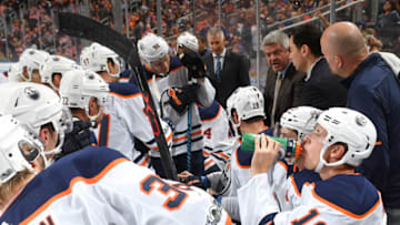 EDMONTON, AB - SEPTEMBER 23: Todd McLellan of the Edmonton Oilers discusses the play with the players during the preseason game against the Winnipeg Jets on September 23, 2017 at Rogers Place in Edmonton, Alberta, Canada. (Photo by Andy Devlin/NHLI via Getty Images)