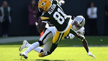 GREEN BAY, WISCONSIN - OCTOBER 20: Daryl Worley #20 of the Oakland Raiders attempts to tackle Geronimo Allison #81 of the Green Bay Packers during the first half in the game at Lambeau Field on October 20, 2019 in Green Bay, Wisconsin. (Photo by Stacy Revere/Getty Images)