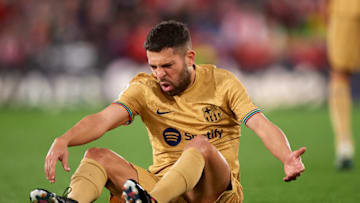 ALMERIA, SPAIN - FEBRUARY 26: Jordi Alba of FC Barcelona lies injured on the pitch during the LaLiga Santander match between UD Almeria and FC Barcelona at Power Horse Stadium on February 26, 2023 in Almeria, Spain. (Photo by Silvestre Szpylma/Quality Sport Images/Getty Images)