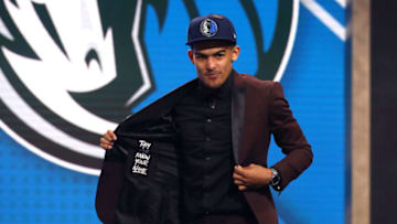 NEW YORK, NY - JUNE 21: Trae Young reacts after being drafted fifth overall by the Dallas Mavericks during the 2018 NBA Draft at the Barclays Center on June 21, 2018 in the Brooklyn borough of New York City. NOTE TO USER: User expressly acknowledges and agrees that, by downloading and or using this photograph, User is consenting to the terms and conditions of the Getty Images License Agreement. (Photo by Mike Stobe/Getty Images)