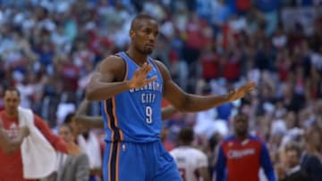 May 11, 2014; Los Angeles, CA, USA; Oklahoma City Thunder forward Serge Ibaka (9) reacts in the fourth quarter in game four of the second round of the 2014 NBA Playoffs against the Los Angeles Clippers at Staples Center. The Clippers defeated the Thunder 101-99 to tie the series 2-2.Mandatory Credit: Kirby Lee-USA TODAY Sports