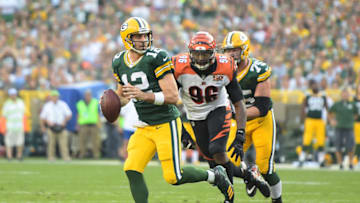 GREEN BAY, WI - SEPTEMBER 24: Aaron Rodgers #12 of the Green Bay Packers rolls out looking to pass during the fourth quarter against the Cincinnati Bengals at Lambeau Field on September 24, 2017 in Green Bay, Wisconsin. (Photo by Stacy Revere/Getty Images)