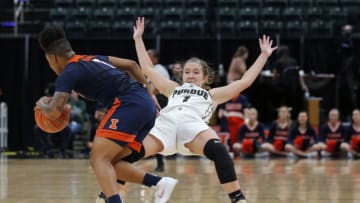INDIANAPOLIS, IN - MARCH 06: Purdue Boilermakers guard Karissa McLaughlin (1) falls backwards after colliding with Illinois Fighting Illini guard Brandi Beasley (1) during the game between the Illinois Fighting Illini and the Purdue Boilermakers on March 06, 2019, at Bankers Life Fieldhouse in Indianapolis, IN. (Photo by Jeffrey Brown/Icon Sportswire via Getty Images)