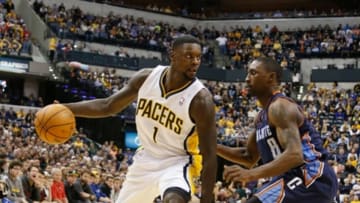 Dec 13, 2013; Indianapolis, IN, USA; Indiana Pacers guard Lance Stephenson (1) drives to the basket against Charlotte Bobcats guard Ben Gordon (8) at Bankers Life Fieldhouse. Indiana Pacers defeat Charlotte 99-94. Mandatory Credit: Brian Spurlock-USA TODAY Sports