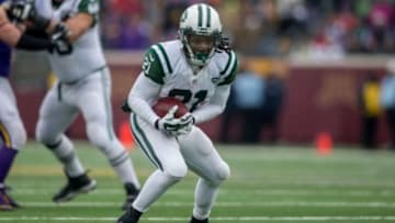 Dec 7, 2014; Minneapolis, MN, USA; New York Jets running back Chris Johnson (21) catches a pass against the Minnesota Vikings in the third quarter at TCF Bank Stadium. The Vikings win 30-24. Mandatory Credit: Bruce Kluckhohn-USA TODAY Sports