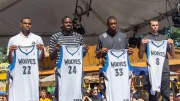 Aug 26, 2014; St. Paul, MN, USA; The newest Minnesota Timberwolves display their new jerseys (left to right) guard Andrew Wiggins, forward Anthony Bennett, forward Thaddeus Young, and guard Zach LaVine at Minnesota State Fair. Mandatory Credit: Brad Rempel-USA TODAY Sports