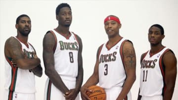 Sep 30, 2013; St. Francis, WI, USA; From left Milwaukee Bucks players O.J. Mayo , Larry Sanders , Caron Butler , and Brandon Knight pose for a photo at Milwaukee Bucks Training Center. Mandatory Credit: Mary Langenfeld-USA TODAY Sports