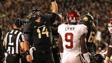 Nov 7, 2013; Waco, TX, USA; Baylor Bears quarterback Bryce Petty (14) celebrates scoring a touchdown against the Oklahoma Sooners in the second quarter at Floyd Casey Stadium. Mandatory Credit: Tim Heitman-USA TODAY Sports