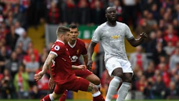 LIVERPOOL, ENGLAND - OCTOBER 14: Romelu Lukaku of Manchester United is put under pressure by Alberto Moreno of Liverpool during the Premier League match between Liverpool and Manchester United at Anfield on October 14, 2017 in Liverpool, England. (Photo by Shaun Botterill/Getty Images)