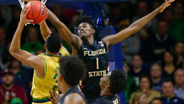 SOUTH BEND, IN - FEBRUARY 11: Jonathan Isaac #1 of the Florida State Seminoles reaches for the shot put up by Bonzie Colson #35 of the Notre Dame Fighting Irish at Purcell Pavilion on February 11, 2017 in South Bend, Indiana. Notre Dame defeated Florida State 84-72. (Photo by Michael Hickey/Getty Images)