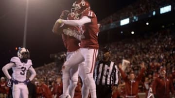 Nov 21, 2015; Norman, OK, USA; Oklahoma Sooners wide receiver Dede Westbrook (11) and Oklahoma Sooners wide receiver Sterling Shepard (3) celebrate in the endzone after a touchdown against the TCU Horned Frogs during the second quarter at Gaylord Family - Oklahoma Memorial Stadium. Mandatory Credit: Mark D. Smith-USA TODAY Sports