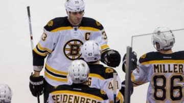 Feb 13, 2016; Saint Paul, MN, USA; Boston Bruins defenseman Zdeno Chara (33) celebrates his goal in the third period against the Minnesota Wild at Xcel Energy Center. The Boston Bruins beat the Minnesota Wild 4-2. Mandatory Credit: Brad Rempel-USA TODAY Sports