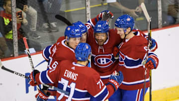 BATHURST, NEW BRUNSWICK - SEPTEMBER 18: Matthew Peca #63 of the Montreal Canadiens celebrates his goal against the Florida Panthers with team-mates Cale Fleury #83, Alex Belzile #60, Otto Leskinen #64 and Jake Evans #71 at the K.C. Irving Regional Centre in pre-season action on September 18, 2019 in Bathurst, New Brunswick, Canada. (Photo by Minas Panagiotakis/NHLI via Getty Images)