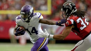 Nov 29, 2015; Atlanta, GA, USA; Minnesota Vikings wide receiver Stefon Diggs (14) runs after a catch against Atlanta Falcons cornerback Jalen Collins (32) in the first quarter of their game at the Georgia Dome. Mandatory Credit: Jason Getz-USA TODAY Sports