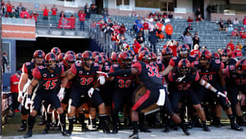 CARSON, CA - NOVEMBER 26: Patrick McMorris #33 of the San Diego State Aztecs leads the team out against the Boise State Broncos on November 26, 2021 at Dignity Health Sports Park in Carson, California. (Photo by Tom Hauck/Getty Images)