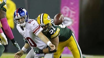 Oct 9, 2016; Green Bay, WI, USA; Green Bay Packers outside linebacker Kyler Fackrell (51) sacks New York Giants quarterback Eli Manning (10) during the first half at Lambeau Field. Mandatory Credit: Rick Wood/Milwaukee Journal Sentinel via USA TODAY Sports