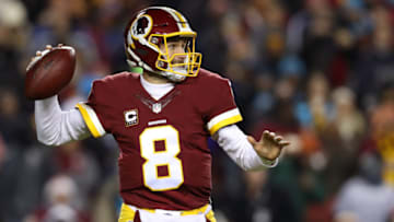 LANDOVER, MD - DECEMBER 19: Quarterback Kirk Cousins #8 of the Washington Redskins drops back to pass against the Carolina Panthers in the first quarter at FedExField on December 19, 2016 in Landover, Maryland. (Photo by Patrick Smith/Getty Images)