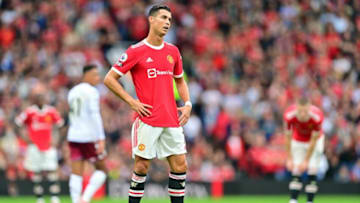 Manchester United's Portuguese striker Cristiano Ronaldo reacts during the English Premier League football match between Manchester United and Aston Villa at Old Trafford in Manchester, north west England, on September 25, 2021. - RESTRICTED TO EDITORIAL USE. No use with unauthorized audio, video, data, fixture lists, club/league logos or 'live' services. Online in-match use limited to 120 images. An additional 40 images may be used in extra time. No video emulation. Social media in-match use limited to 120 images. An additional 40 images may be used in extra time. No use in betting publications, games or single club/league/player publications. (Photo by Paul ELLIS / AFP) / RESTRICTED TO EDITORIAL USE. No use with unauthorized audio, video, data, fixture lists, club/league logos or 'live' services. Online in-match use limited to 120 images. An additional 40 images may be used in extra time. No video emulation. Social media in-match use limited to 120 images. An additional 40 images may be used in extra time. No use in betting publications, games or single club/league/player publications. / RESTRICTED TO EDITORIAL USE. No use with unauthorized audio, video, data, fixture lists, club/league logos or 'live' services. Online in-match use limited to 120 images. An additional 40 images may be used in extra time. No video emulation. Social media in-match use limited to 120 images. An additional 40 images may be used in extra time. No use in betting publications, games or single club/league/player publications. (Photo by PAUL ELLIS/AFP via Getty Images)