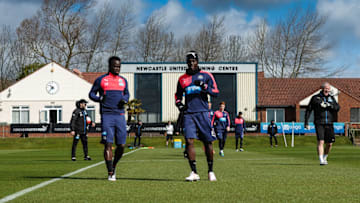 NEWCASTLE UPON TYNE, ENGLAND - APRIL 22: Cheick Tiote (L) and Henri Saivet (R) warm up during the Newcastle United Training session at The Newcastle United Training Centre on April 22, 2016, in Newcastle upon Tyne, England. (Photo by Serena Taylor/Newcastle United via Getty Images)