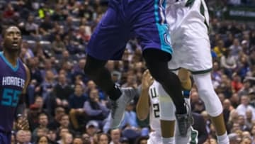 Oct 26, 2016; Milwaukee, WI, USA; Charlotte Hornets forward Michael Kidd-Gilchrist (14) shoots in front of Milwaukee Bucks forward Giannis Antetokounmpo (34) during the second quarter at BMO Harris Bradley Center. Mandatory Credit: Jeff Hanisch-USA TODAY Sports