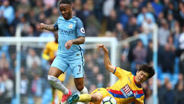MANCHESTER, ENGLAND - MAY 06: Raheem Sterling of Manchester City and Chung-yong Lee of Crystal Palace battle for possession during the Premier League match between Manchester City and Crystal Palace at the Etihad Stadium on May 6, 2017 in Manchester, England. (Photo by Dave Thompson/Getty Images)
