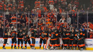 Dec 18, 2021; Philadelphia, Pennsylvania, USA; The Philadelphia Flyers celebrate after defeating the Ottawa Senators in overtime at the Wells Fargo Center. Mandatory Credit: Mitchell Leff-USA TODAY Sports