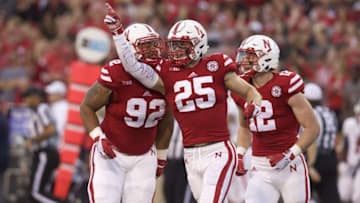 Sep 12, 2015; Lincoln, NE, USA; Nebraska Cornhuskers safety Nate Gerry (25) celebrates his pass interception with tackle Chase Urbach (92) during the game against the South Alabama Jaguars in the fist half at Memorial Stadium. Mandatory Credit: Bruce Thorson-USA TODAY Sports