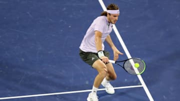 DUBAI, UNITED ARAB EMIRATES - FEBRUARY 29: Stefanos Tsitsipas of Greece in action during the final against Novak Djokovic of Serbia Match Day thirteen of the Dubai Duty Free Tennis at Dubai Duty Free Tennis Stadium on February 29, 2020 in Dubai, United Arab Emirates. (Photo by Amin Mohammad Jamali/Getty Images)