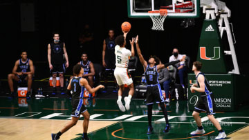 MIAMI, FLORIDA - FEBRUARY 01: Harlond Beverly #5 of the Miami Hurricanes drives to the basket against the Duke Blue Devils during the first half at Watsco Center on February 01, 2021 in Miami, Florida. (Photo by Mark Brown/Getty Images)