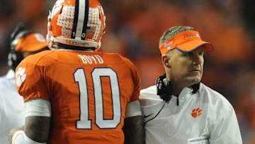 Clemson offensive coordinator Chad Morris and quarterback Tajh Boyd (10) during the 4th quarter of the Chick-fil-A Bowl Monday, December 31, 2012 in the Georgia Dome in Atlanta. BART BOATWRIGHT/StaffChick Fil A Bowl Practice