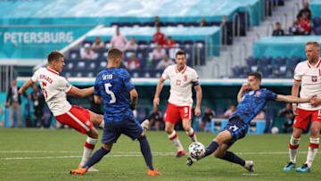 SAINT PETERSBURG, RUSSIA - JUNE 14: Jan Bednarek of Poland shoots and misses during the UEFA Euro 2020 Championship Group E match between Poland and Slovakia at the Saint Petersburg Stadium on June 14, 2021 in Saint Petersburg, Russia. (Photo by Lars Baron/Getty Images)