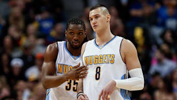 Feb 23, 2016; Denver, CO, USA; Denver Nuggets forward Kenneth Faried (35) talks with forward Danilo Gallinari (8) in the second quarter against the Sacramento Kings at Pepsi Center. Mandatory Credit: Isaiah J. Downing-USA TODAY Sports